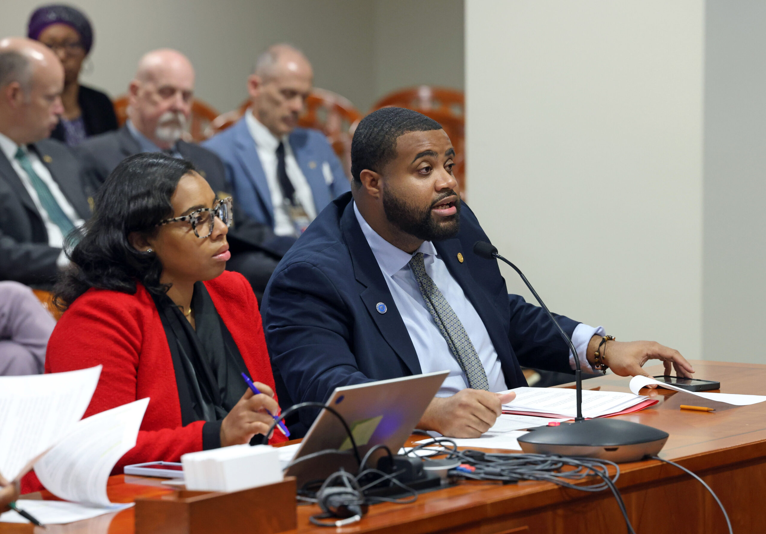 Reps. Kristian Grant and Donavan McKinney testifying in the House Criminal Justice Committee on Tuesday, Dec. 10 at the Anderson House Office Building in Lansing.