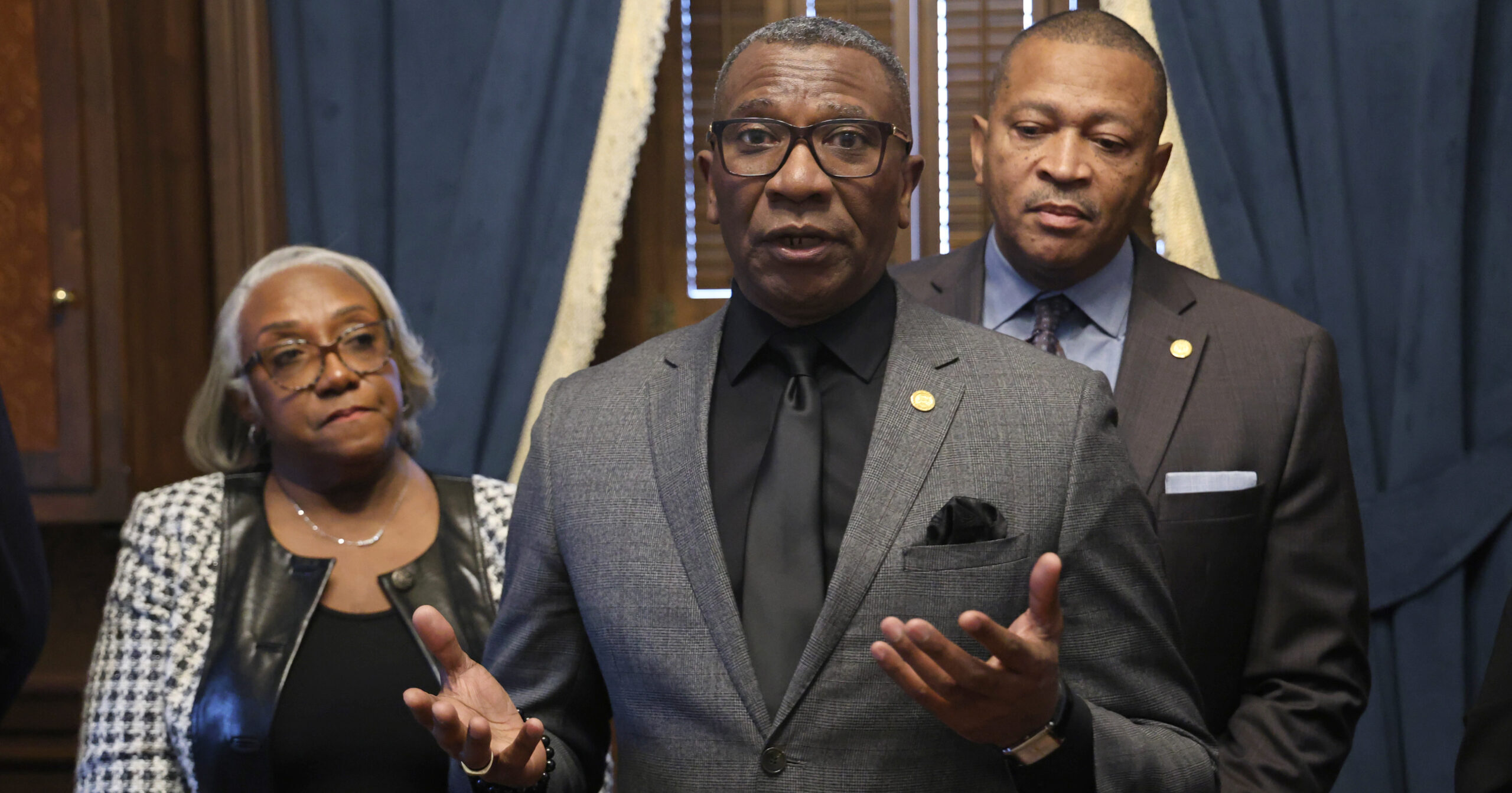 Michigan State Representative Amos O'Neal speaks at a press conference at the Capitol.