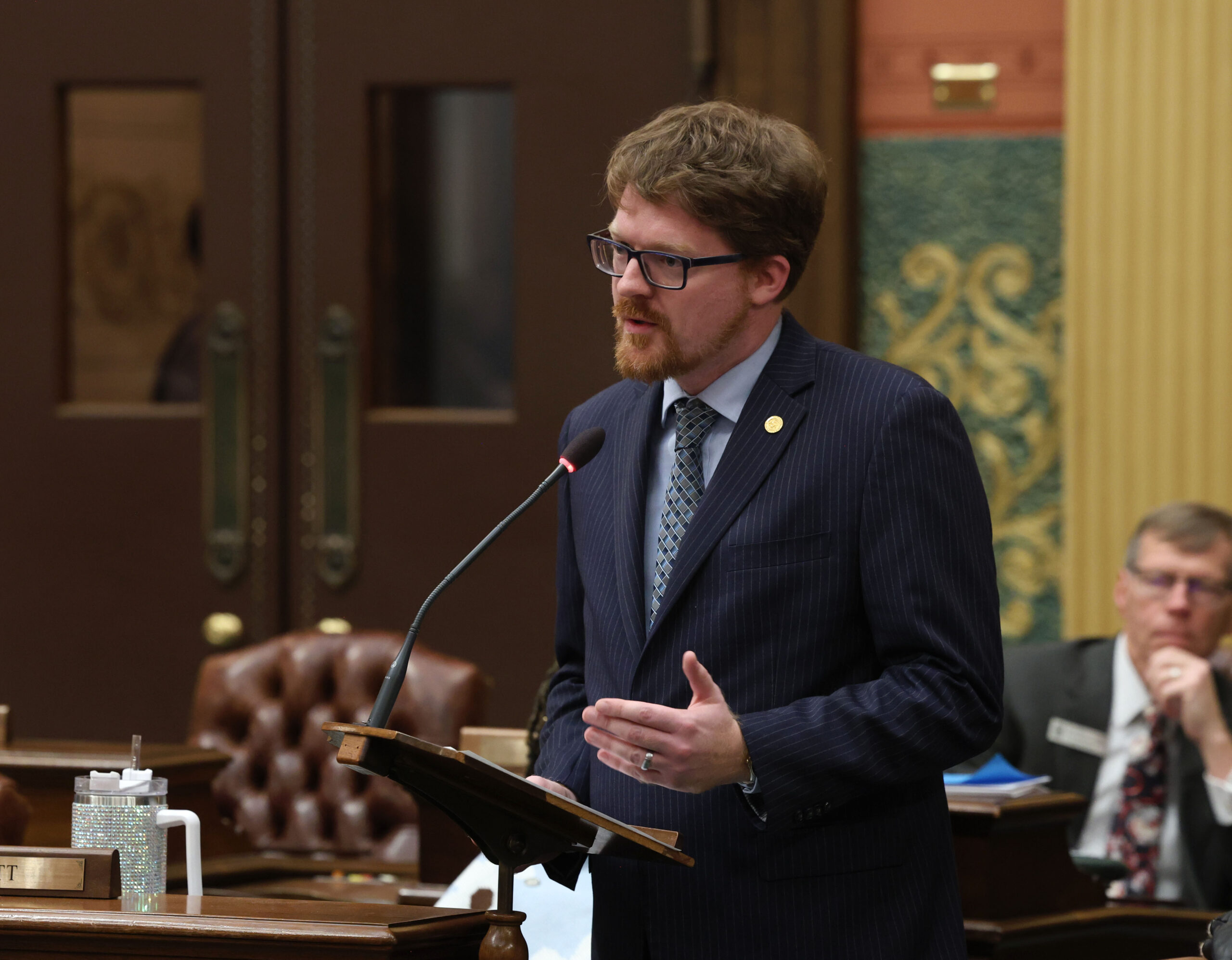 Michigan State Representative Joey Andrews speaks on the House floor.