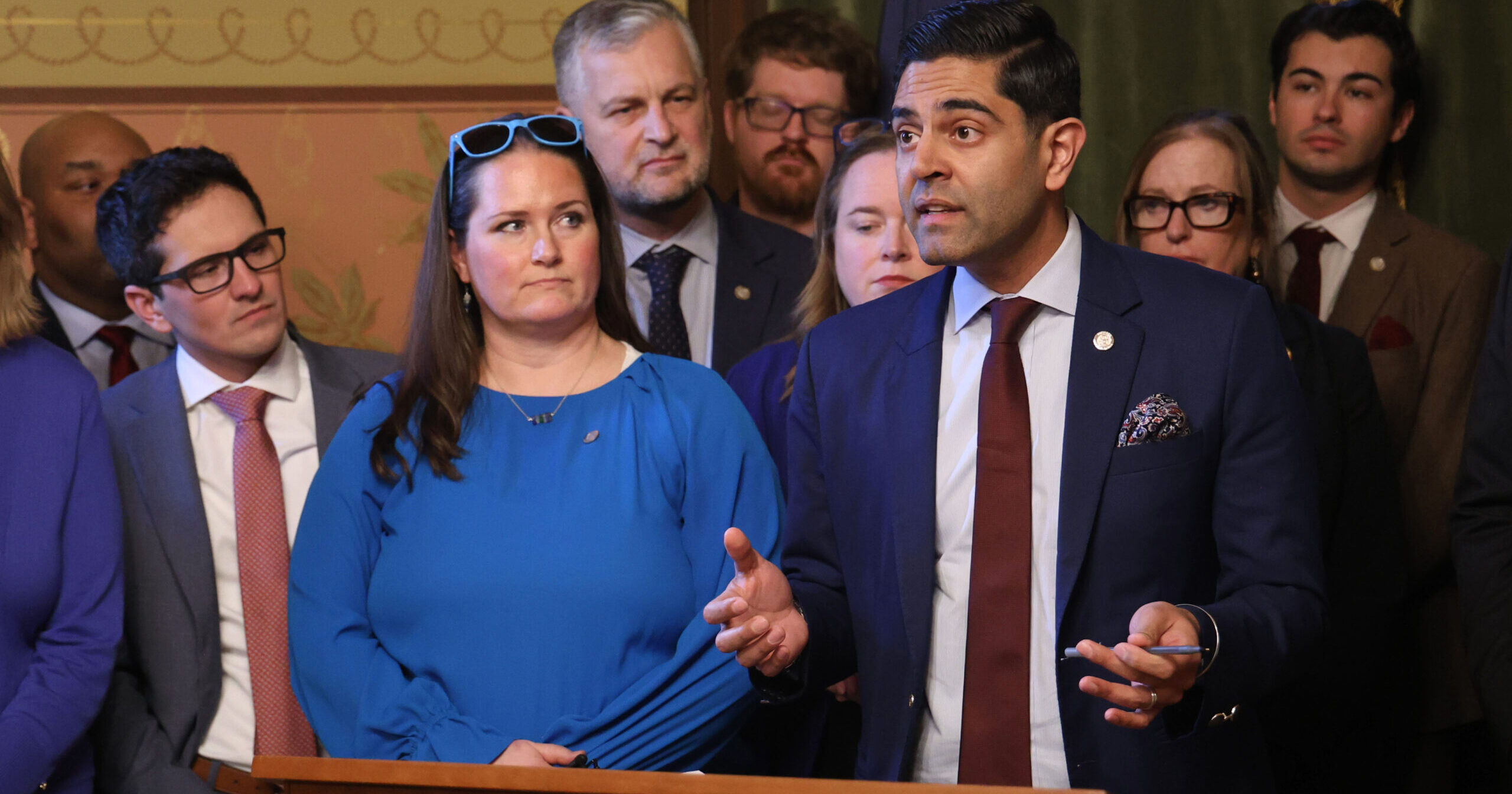 Michigan Democratic Leader Ranjeev Puri speaks at a press conference surrounded by fellow House Dems.