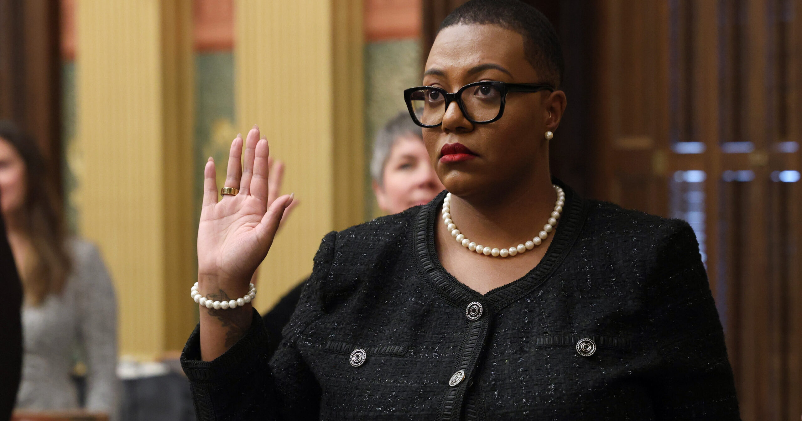 State Representative Morgan Forman takes a ceremonial oath to office on the House Floor