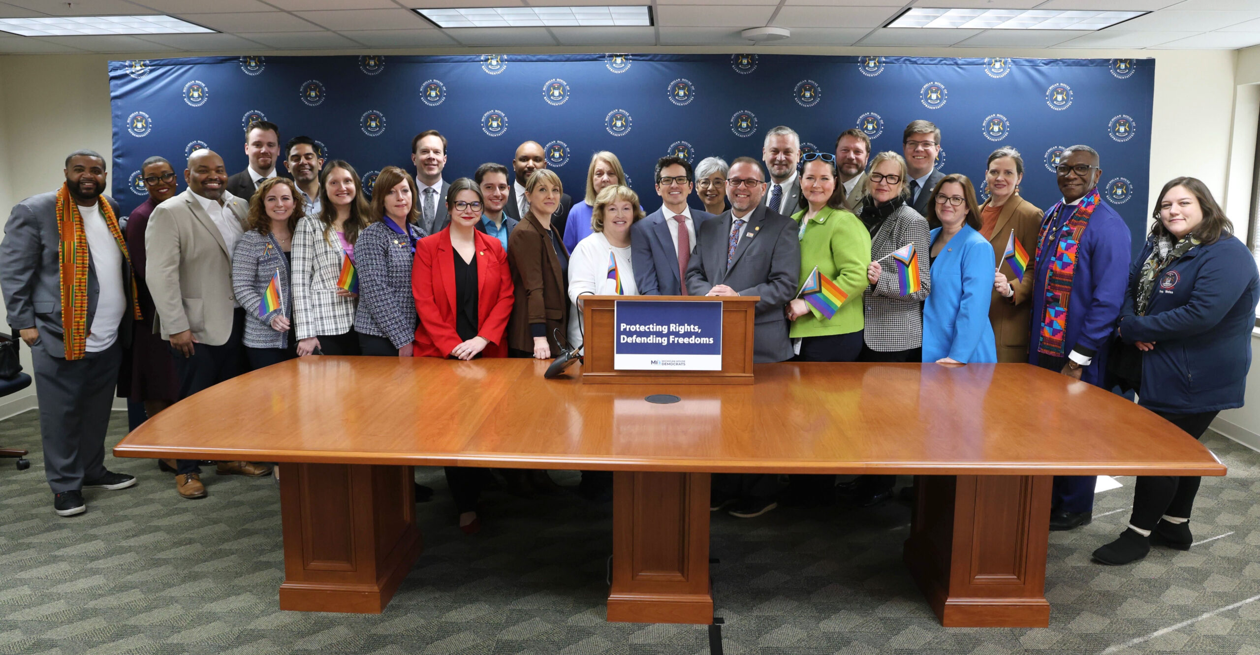 Michigan State Representatives stand at a press conference.