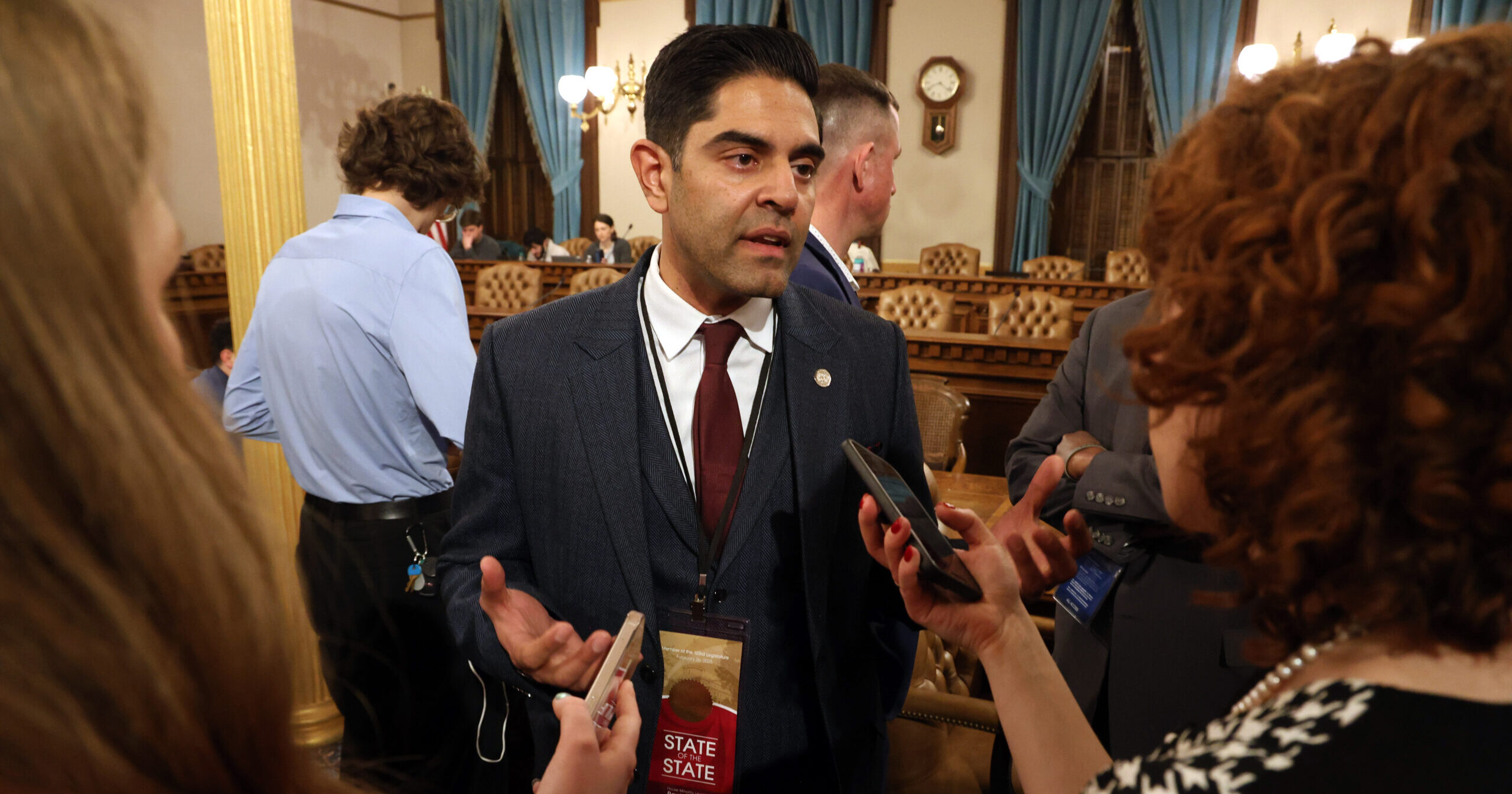 Image of Michigan Democratic Leader Ranjeev Puri talks to press after the state of the state of the state address.