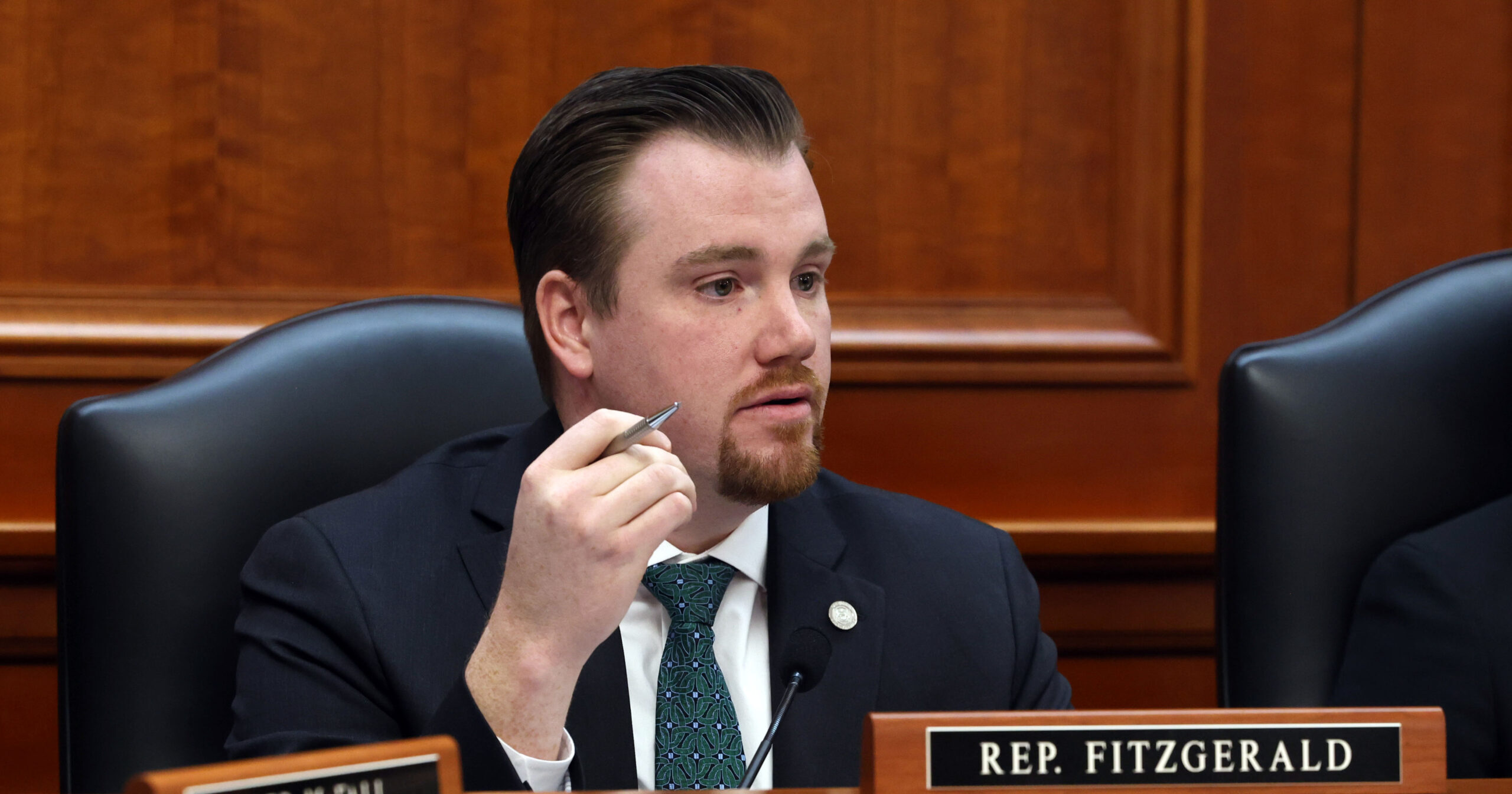 Democratic Floor Leader John Fitzgerald speaking at a committee meeting.