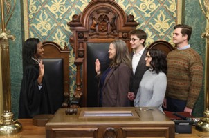 Michigan State Representative Carol Glanville is ceremoniously sworn in by Michigan Supreme Court Justice Kyra Harris Bolden.