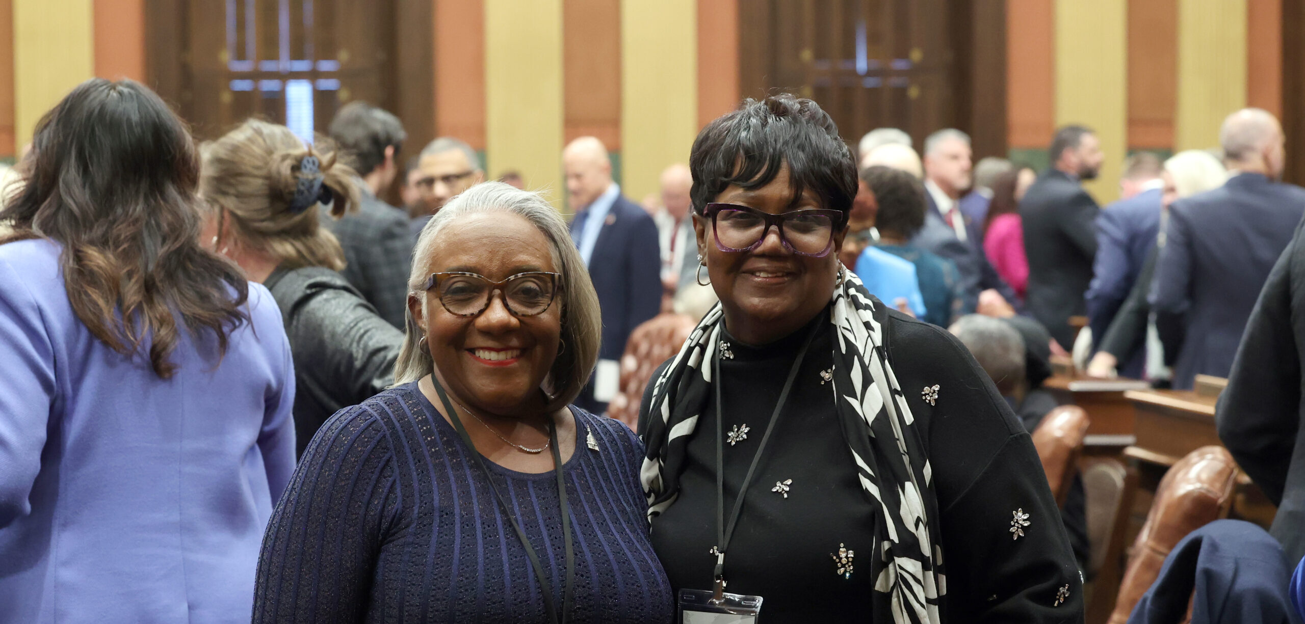 State Rep. Helena Scott and her guest, Maria Dickerson, on the House floor on Wednesday, Feb. 26, 2025, at the Capitol Building in Lansing.