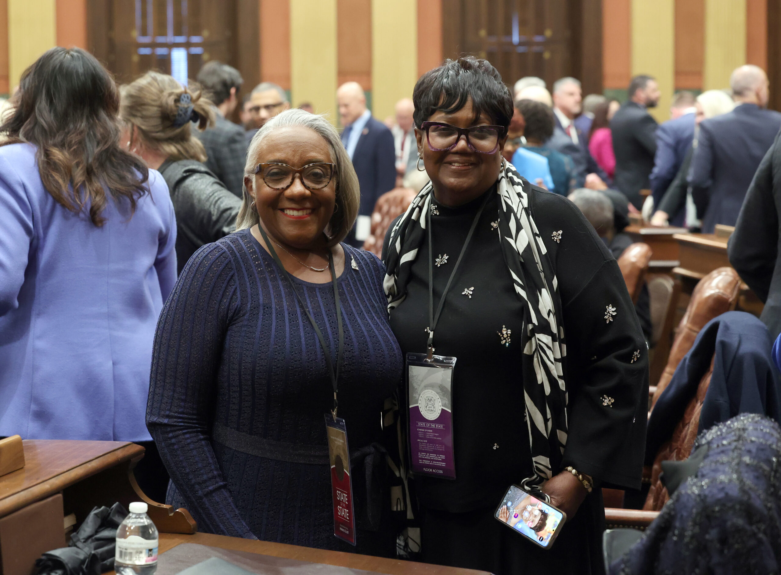 State Rep. Helena Scott and her guest, Maria Dickerson, on the House floor on Wednesday, Feb. 26, 2025, at the Capitol Building in Lansing.