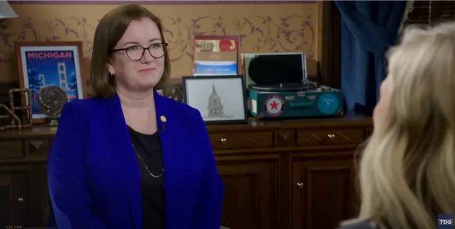 Michigan State Representative Natalie Price speaking with an interviewer on The Daily Show.