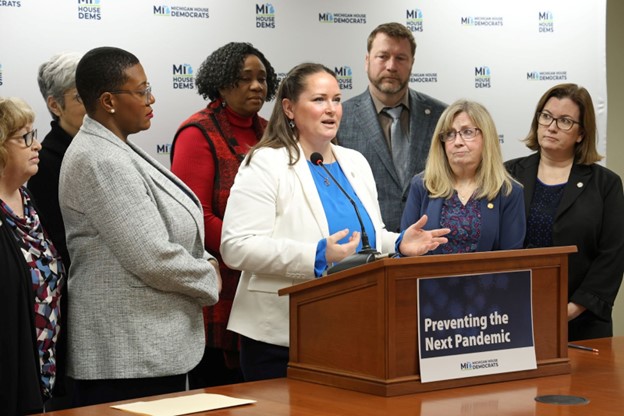 Michigan State Representative Carie Rheingans speaks at a press conference.