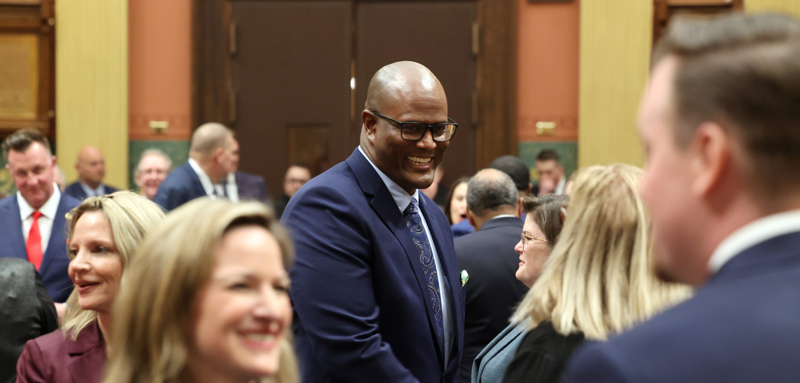 State Rep. Joe Tate walking on the House floor.