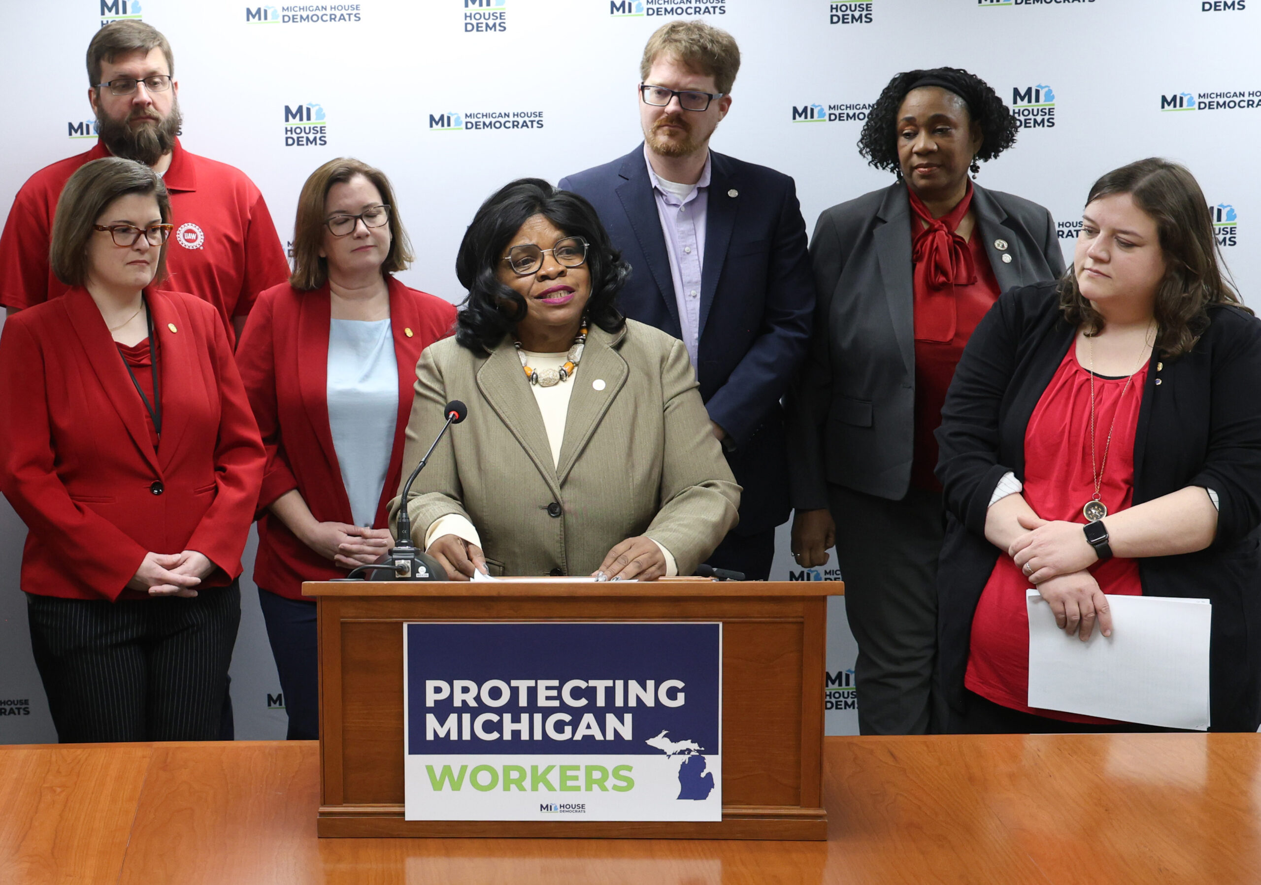 0Q0A3971 Michigan State Representative Brenda Carter at the Workers Protection Press Conference on May 1, 2025 surrounded by colleagues and supporters.