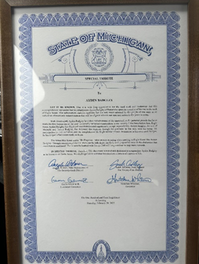 A State of Michigan tribute certificate from the office of state Representative Angela Witwer for Ayden Badgley, an Eagle Scout from Potterville.