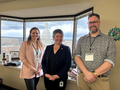 State Rep. Betsy Coffia, center, meeting with constituents Jenny Hartman and Jon Timm from Traverse City’s North Arrow ABA to discuss access to behavioral health.