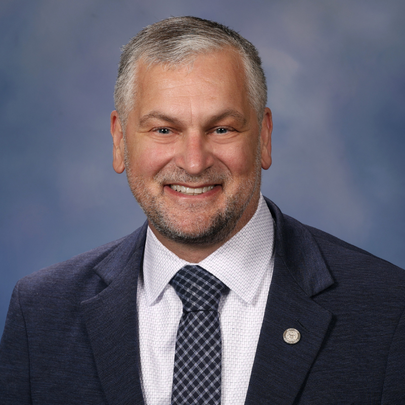 Skaggs Headshot – 801×801-3 Official portrait of State Representative Phil Skaggs
