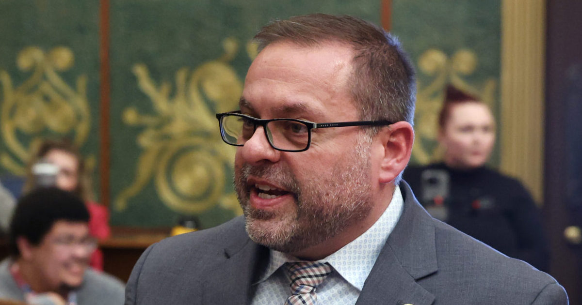 State Rep. Mike McFall speaking on the House floor at the Capitol building in Lansing.