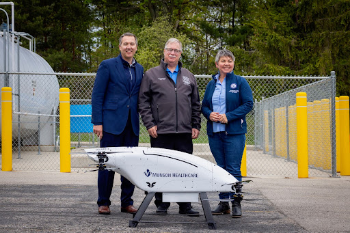 State Rep. Betsy Coffia with Traverse Connect CEO Warren Call and state Rep. John Roth at Munson Healthcare’s Drone Delivery Project demonstration.