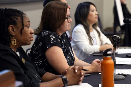 State Rep. Price (center) sits alongside her Democratic colleagues at the Vision Project Education Town Hall. 