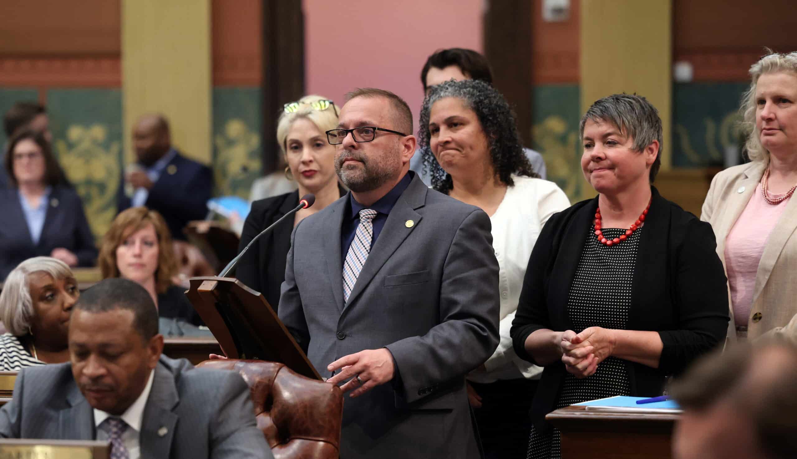 State Rep. Mike McFall (D-Hazel Park) speaks on the House floor at the Capitol building in Lansing.