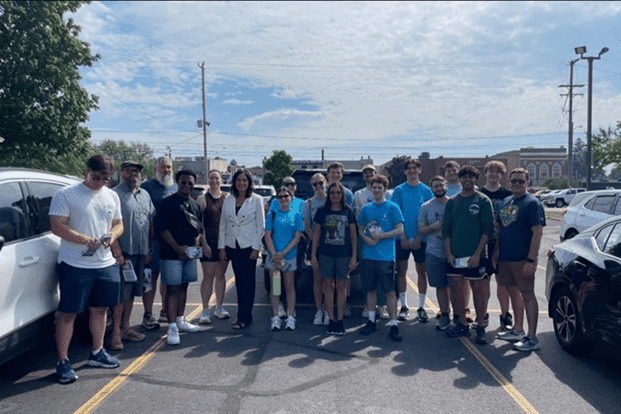 Michigan state Representative Angela Witwer with canvassers in the community.