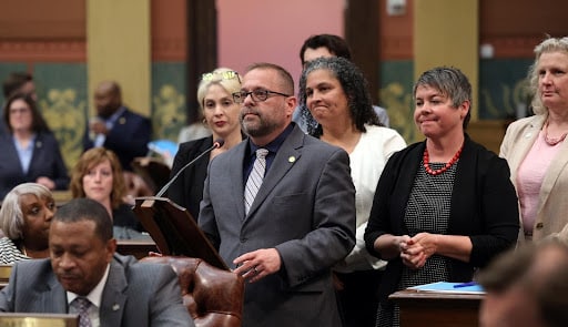 State Rep. Mike McFall (D-Hazel Park) speaks on the House floor at the Capitol building in Lansing.
