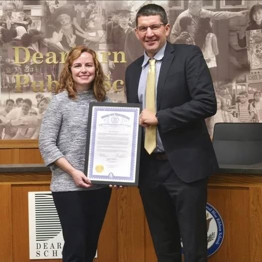 State Rep. Erin Byrnes presenting a Tribute to Superintendent Maleyko