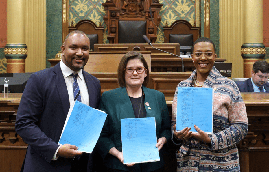 State Rep. Jimmie Wilson, Jr. (D-Ypsilanti) introduced a package of bills to strengthen workplace protections for survivors of domestic violence and their families with state Reps. Kara Hope (center) and Morgan Foreman on Dec. 18, 2025, in Lansing.