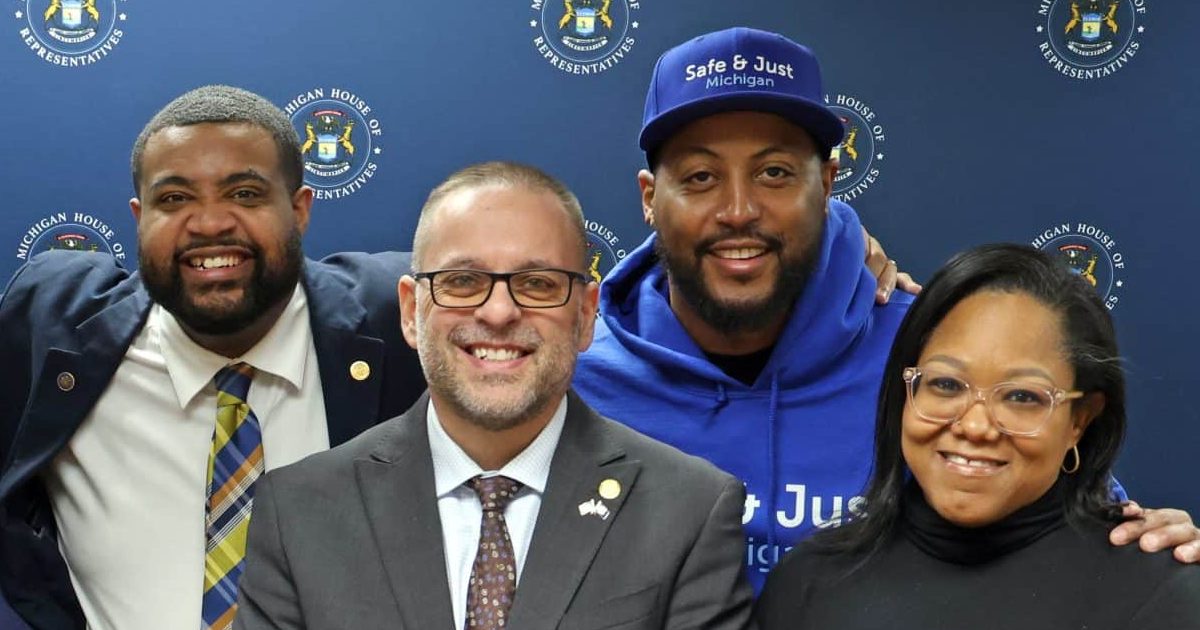 State Reps. Kimberly Edwards (D-Eastpointe), Mike McFall (D-Hazel Park) and Donavan McKinney (D-Detroit) standing with stakeholders at the Returning Citizens Identification press conference on Tuesday, March 3, 2026