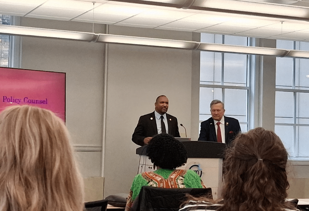 State Reps. Jimmie Wilson, Jr. (D-Ypsilanti) and Doug Wozniak (R-Shelby Twp.) speaking to colleagues and stakeholders about their bipartisan legislation addressing data acquired from license plate reader technology on Feb. 18 in Lansing.