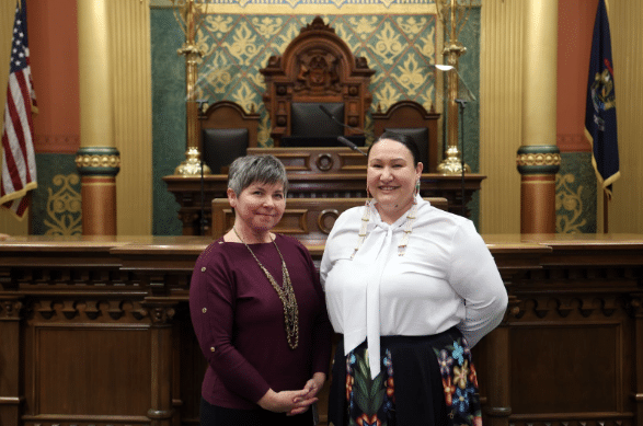 State Rep. Betsy Coffia, left, and her guest Sam TwoCrowat the 2026 State of the State address.