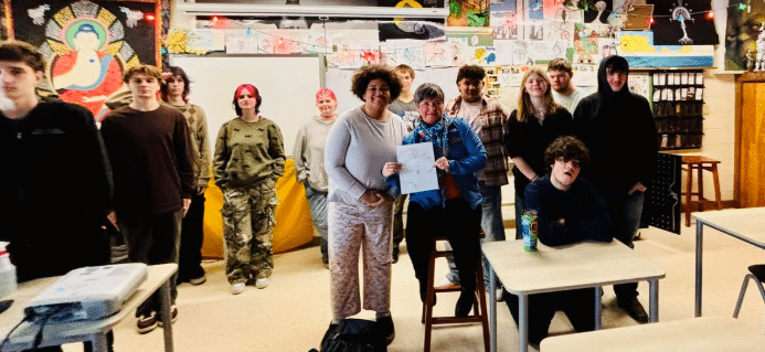 State Rep. Betsy Coffia, center right, with students from Mr. Joshua Veith’s civics class at Traverse City High School on Feb. 17.