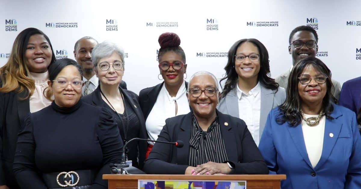 State Rep. Helena Scott (D-Detroit) stands with fellow House Democrats and community stakeholders at the H.O.P.E. Zones press conference on Thursday, April 23, 2026 at the Anderson House Office Building in Lansing.