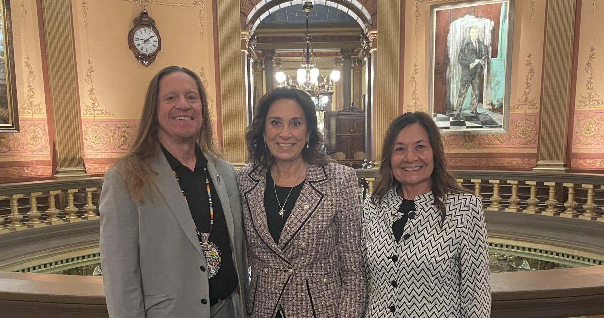 From left to right, Tribal Legislative Liaison Jamie Stuck, state Rep. Angela Witwer and Yvonne Fronczak stand together in the Michigan Capitol Building.